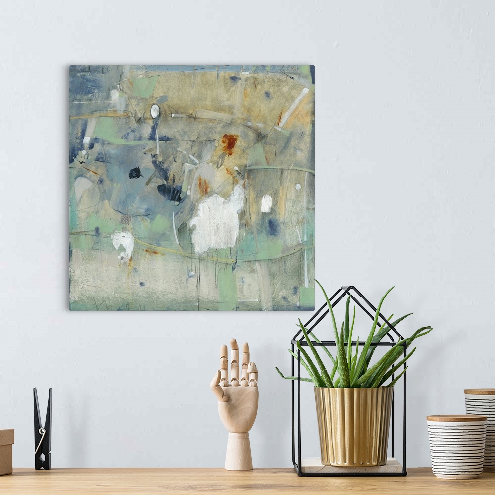 A bohemian room featuring Square abstract painting in muted earth tones of green, blue, orange and white with overlaying fi...