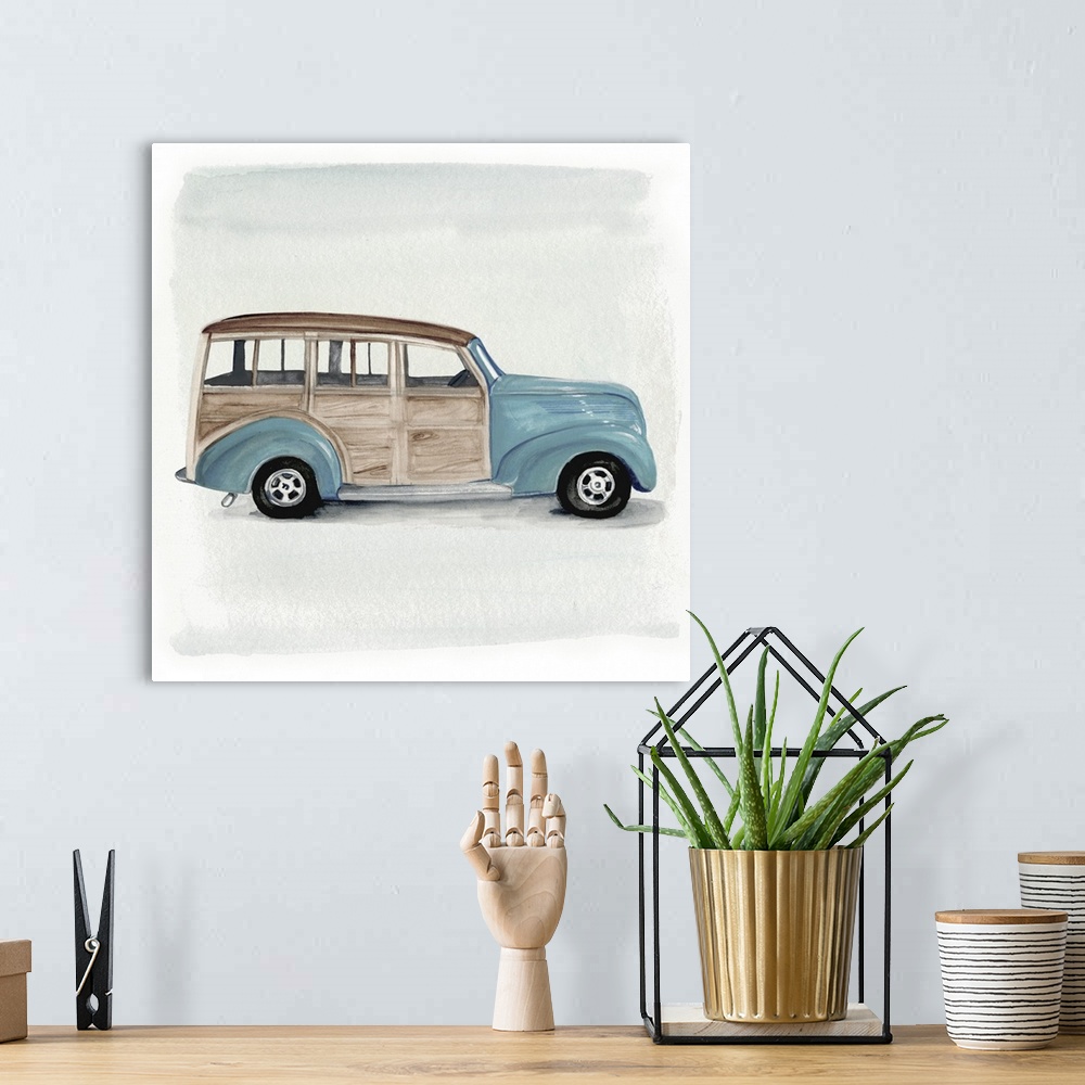 A bohemian room featuring Decorative artwork of a classic blue woody station wagon on gray and white backdrop.