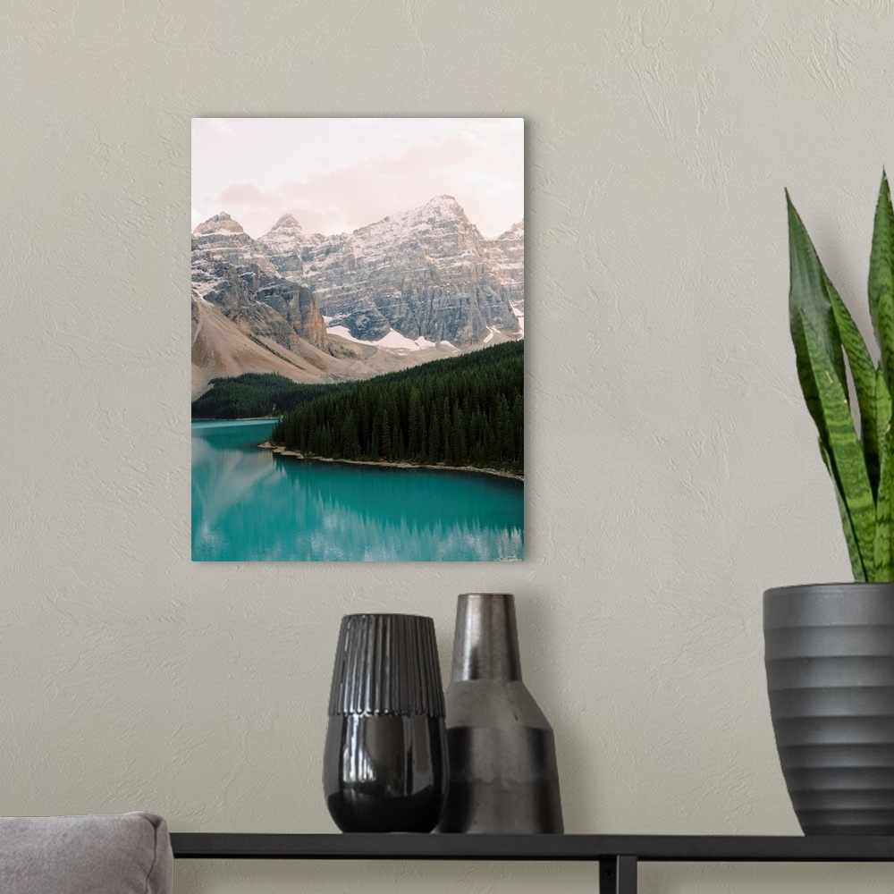 A modern room featuring Photograph of the trees and moutains surrounding Moraine Lake, Banff national park, Canada.