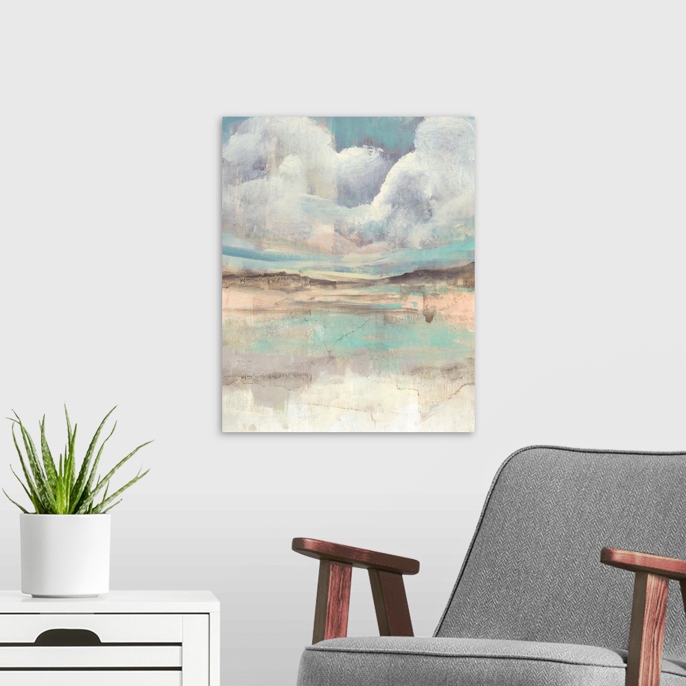 A modern room featuring Contemporary abstract with clouds hovering over a multi-colored landscape.