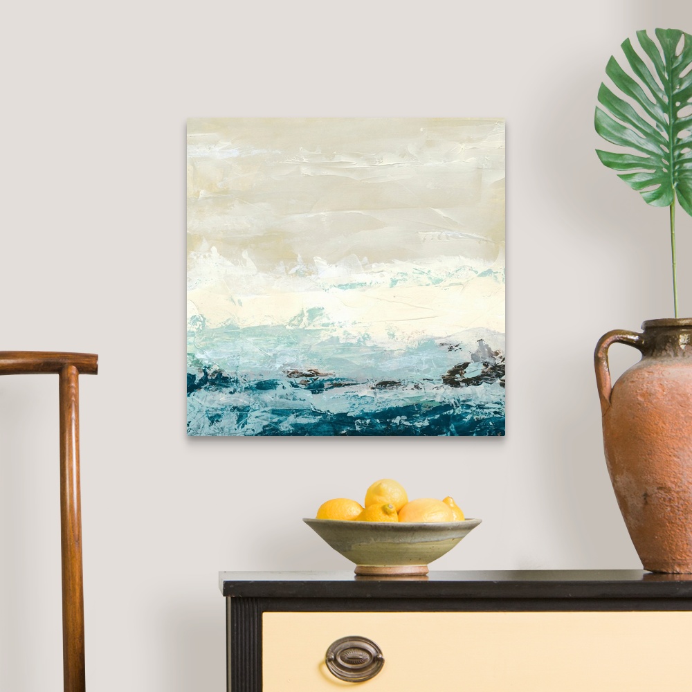 A traditional room featuring Square abstract painting of an ocean made up of large brush strokes.