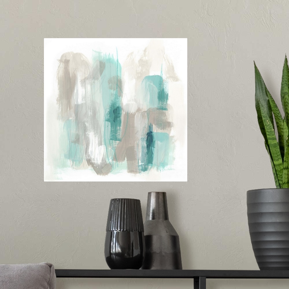 A modern room featuring Grey and aqua toned abstract artwork with broad brushstrokes.