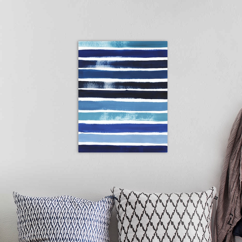 A bohemian room featuring Modern painting of prominent, horizontal brush srtokes in shades of blue on a white background.