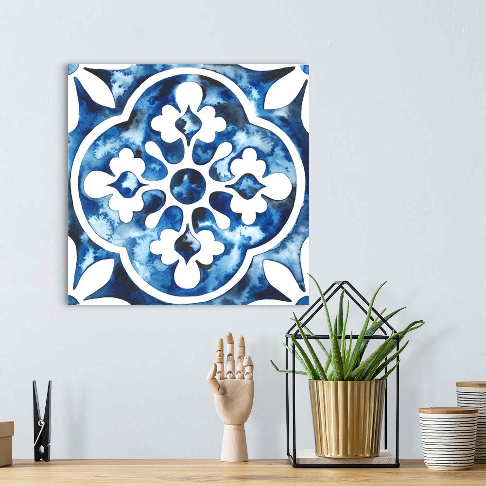 A bohemian room featuring Watercolor painting of a floral tile design in blue and white.