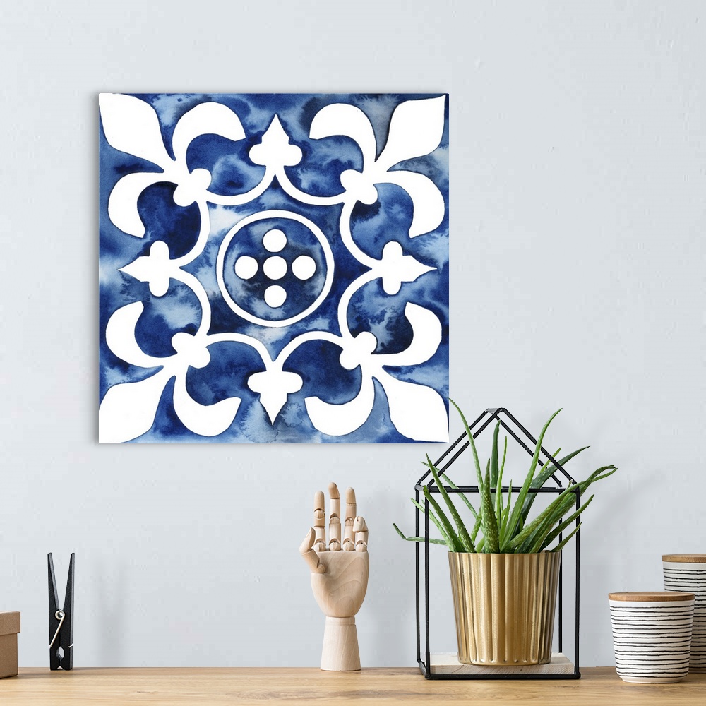A bohemian room featuring Watercolor painting of a floral tile design in blue and white.