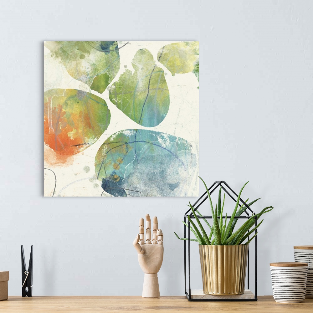 A bohemian room featuring Contemporary abstract painting of organic shapes in multiple colors against a neutral background.