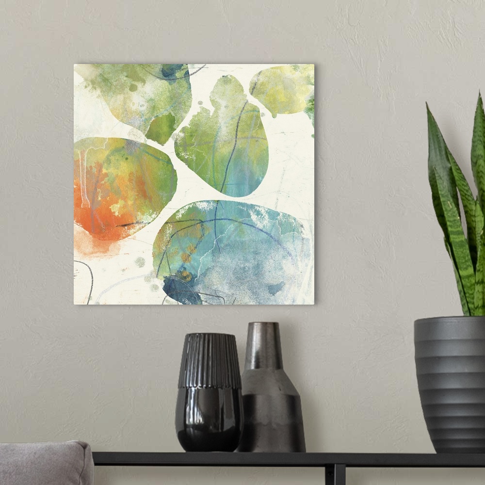 A modern room featuring Contemporary abstract painting of organic shapes in multiple colors against a neutral background.