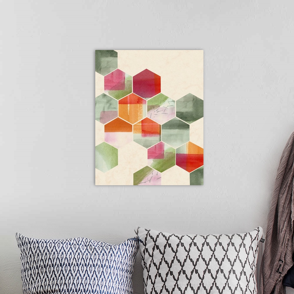 A bohemian room featuring Geometric abstract art of hexagon shapes in red and green.