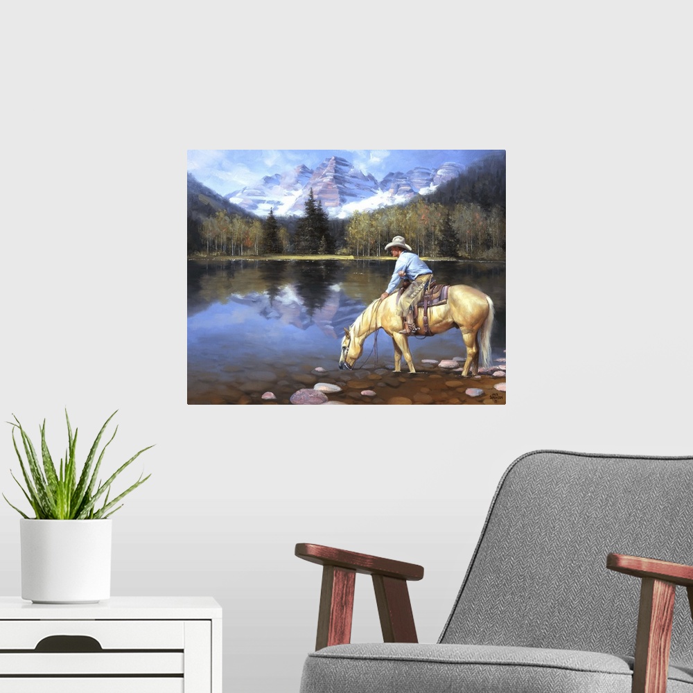 A modern room featuring Contemporary Western artwork of a cowboy on his horse taking a drink from a mountain lake.