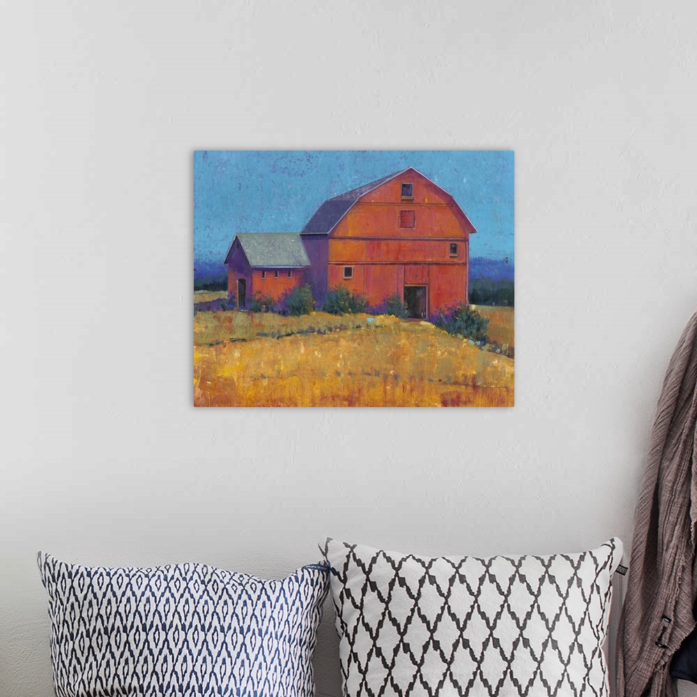 A bohemian room featuring A painting of a simple countryside farmhouse in shades of red, yellow and blue fills this contemp...