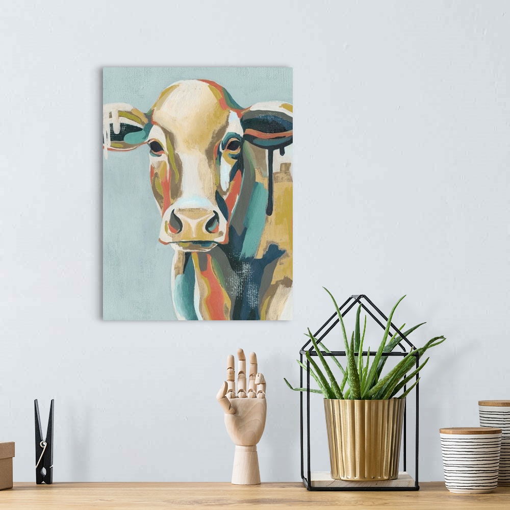 A bohemian room featuring Colorful Cows I