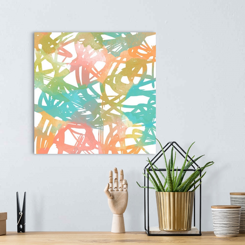 A bohemian room featuring Abstract art in rainbow pastel swirling brushstrokes on white.