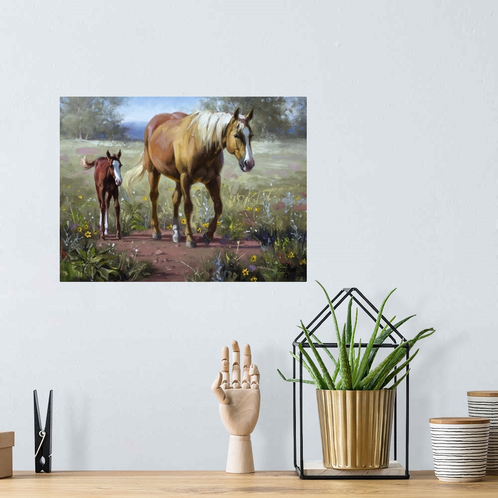 A bohemian room featuring Contemporary Western artwork of a palomino mare and her newborn foal walking across a meadow.