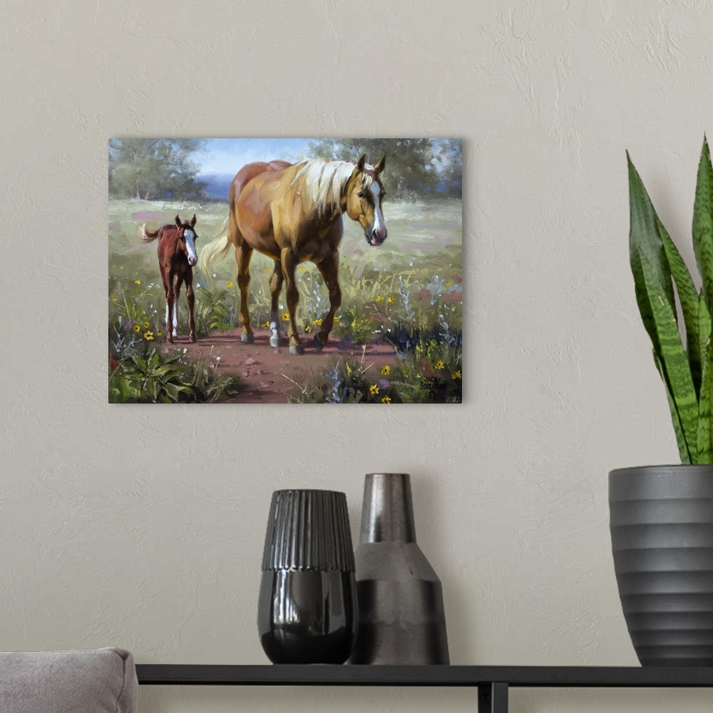 A modern room featuring Contemporary Western artwork of a palomino mare and her newborn foal walking across a meadow.