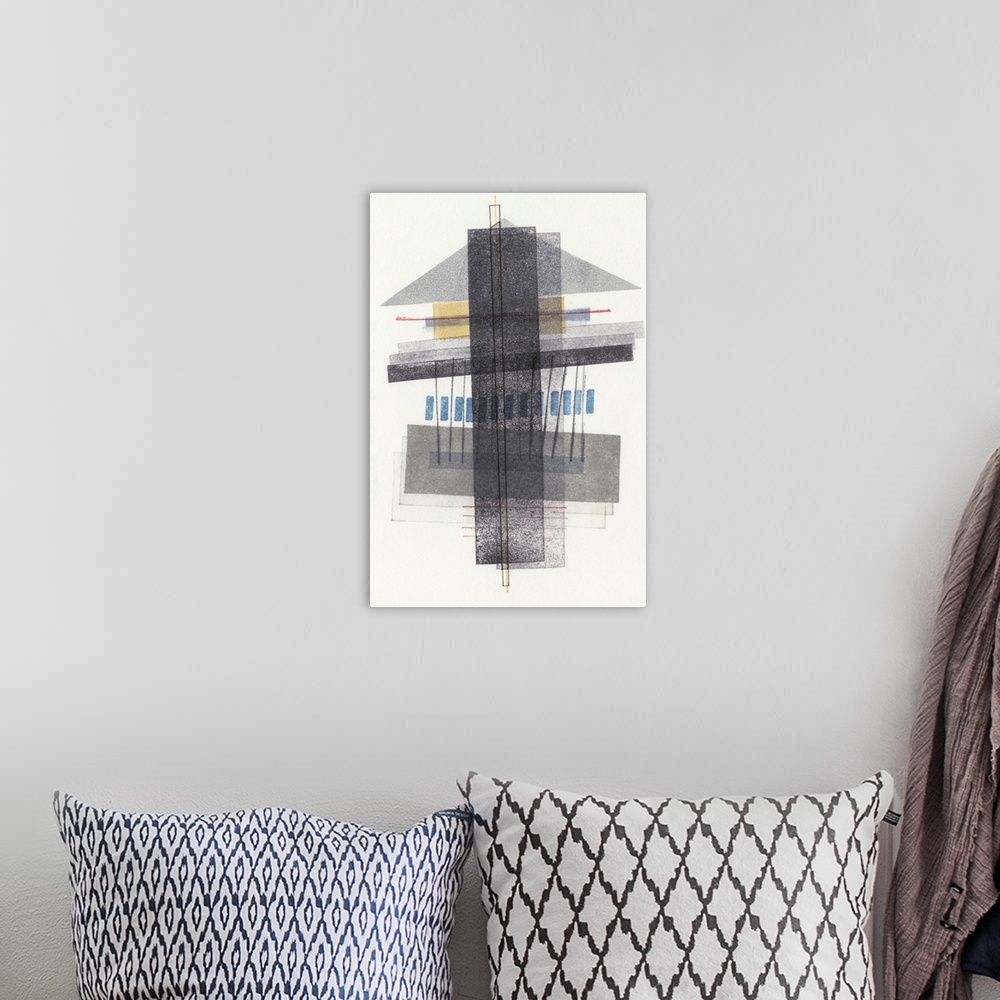 A bohemian room featuring Mid century style abstract geometric artwork of dark grey shapes on white.