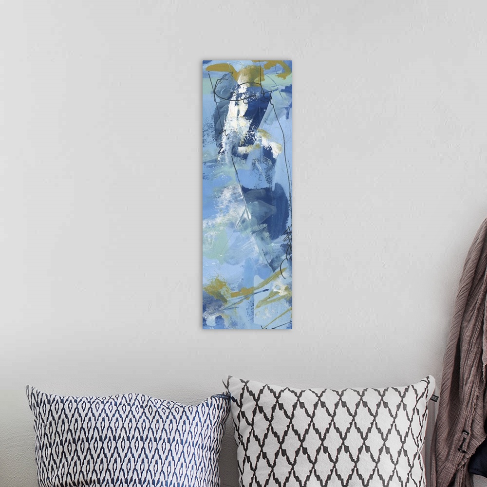A bohemian room featuring Vertical abstract painting in cool blue shades with contrasting yellow.
