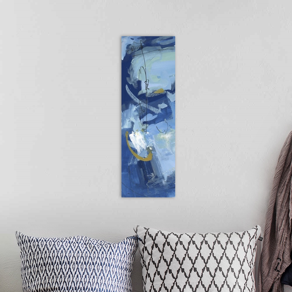 A bohemian room featuring Vertical abstract painting in cool blue shades with contrasting yellow.