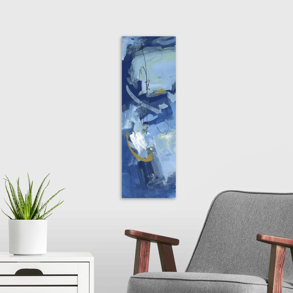 A modern room featuring Vertical abstract painting in cool blue shades with contrasting yellow.