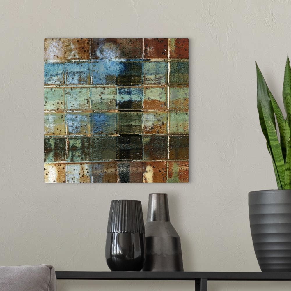 A modern room featuring A contemporary abstract painting of a grid of squares in grungy muted colors.