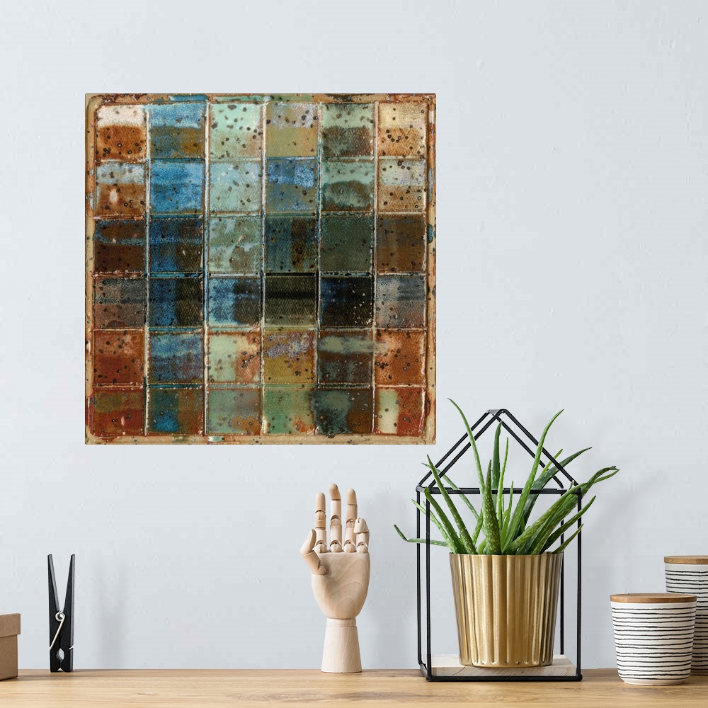 A bohemian room featuring A contemporary abstract painting of a grid of squares in grungy muted colors.