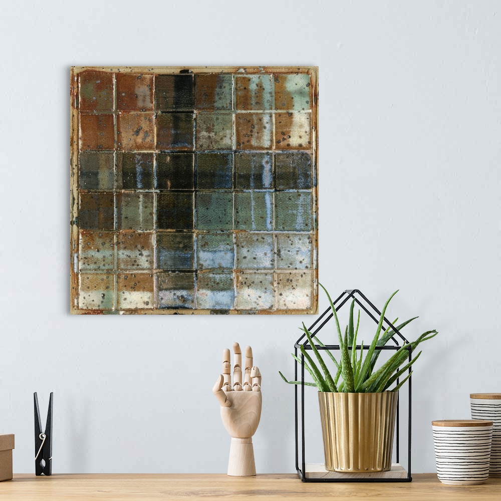 A bohemian room featuring A contemporary abstract painting of a grid of squares in grungy muted colors.