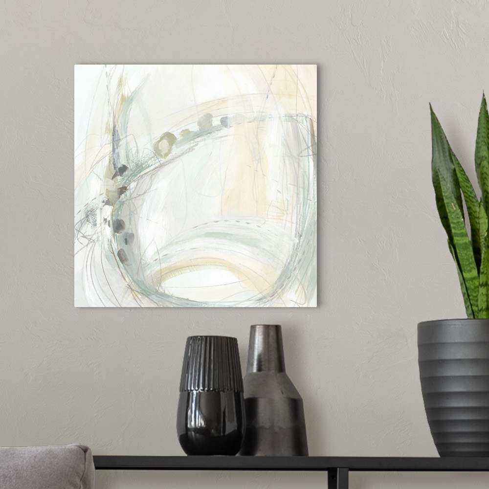 A modern room featuring Swirling abstract artwork in pale neutral tones.