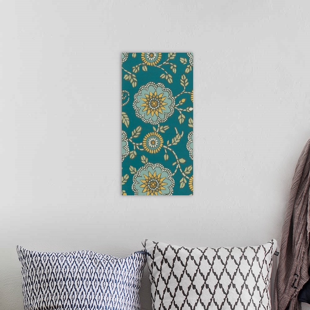 A bohemian room featuring Decorative floral patterned artwork using blue and green tones.