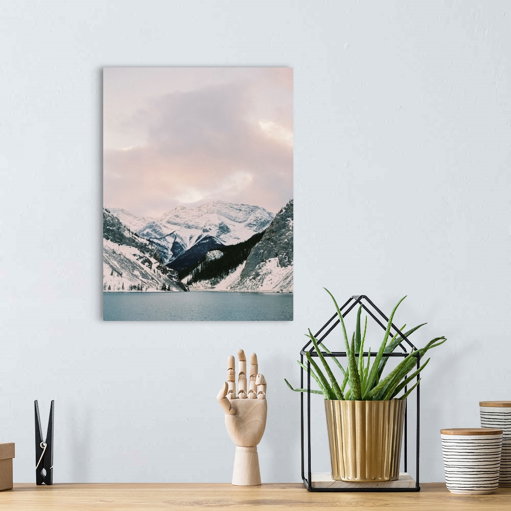 A bohemian room featuring Photograph of snow covered mountains under a pink tinged sky