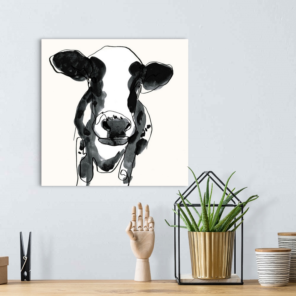 A bohemian room featuring Contemporary watercolor portrait of a cow in black and white.
