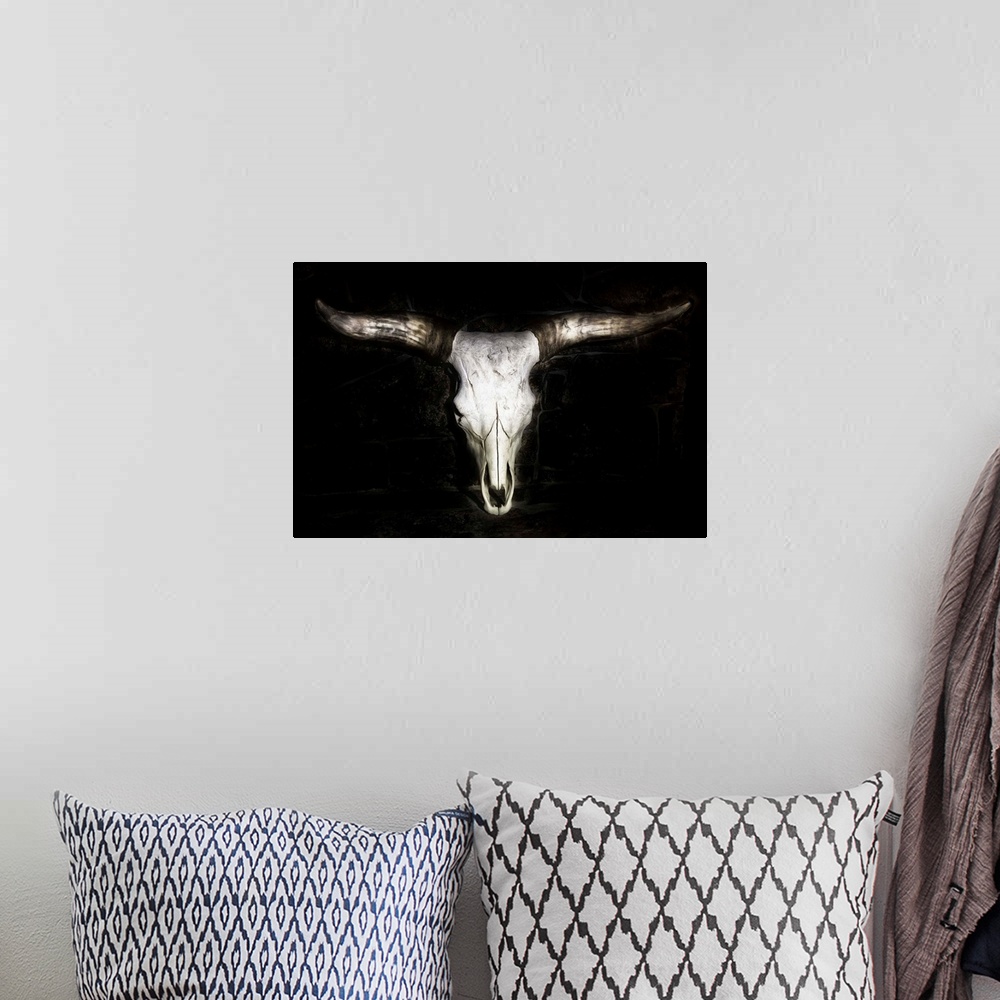 A bohemian room featuring Cow Skull