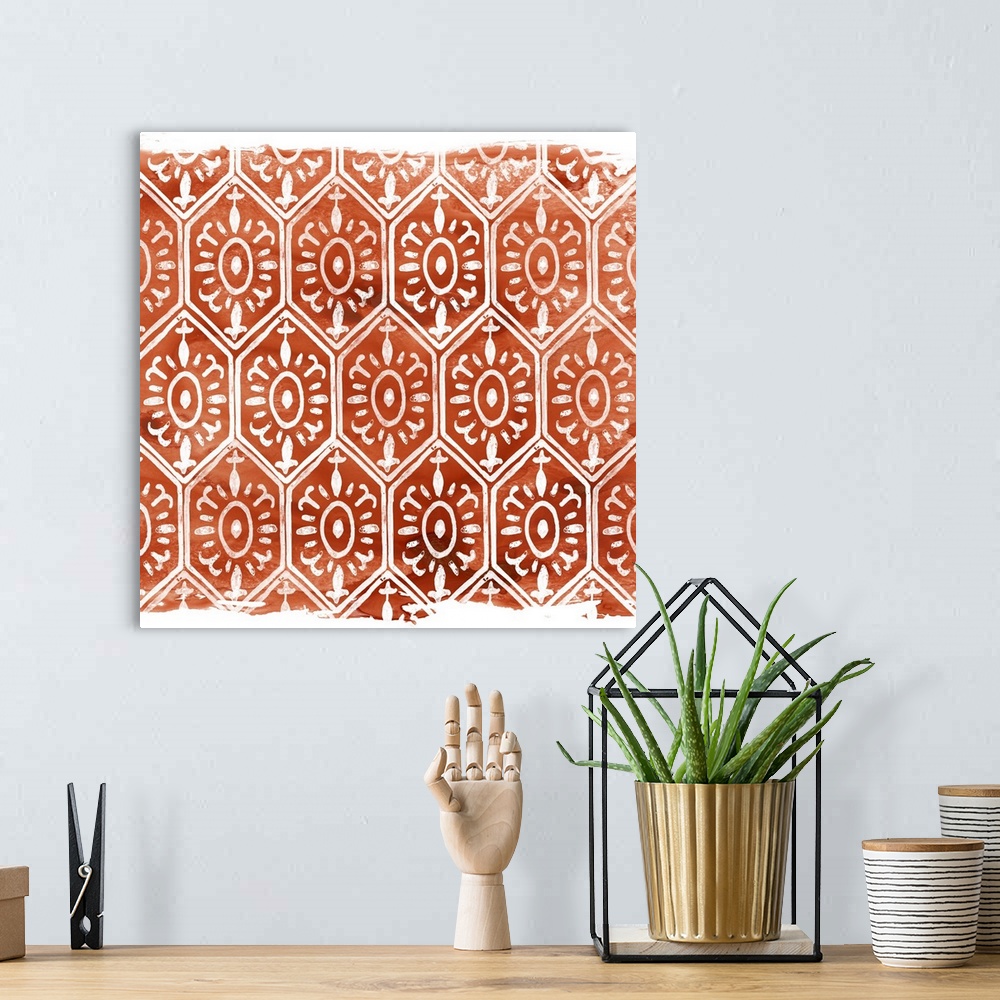 A bohemian room featuring Geometric orange and white classic fabric pattern.