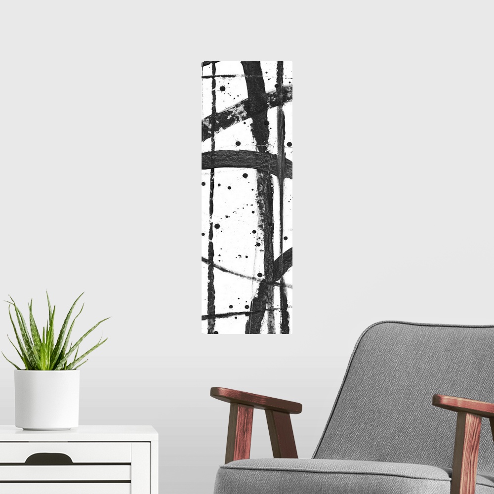 A modern room featuring Contemporary abstract painting with criss-crossing black lines on a white background.