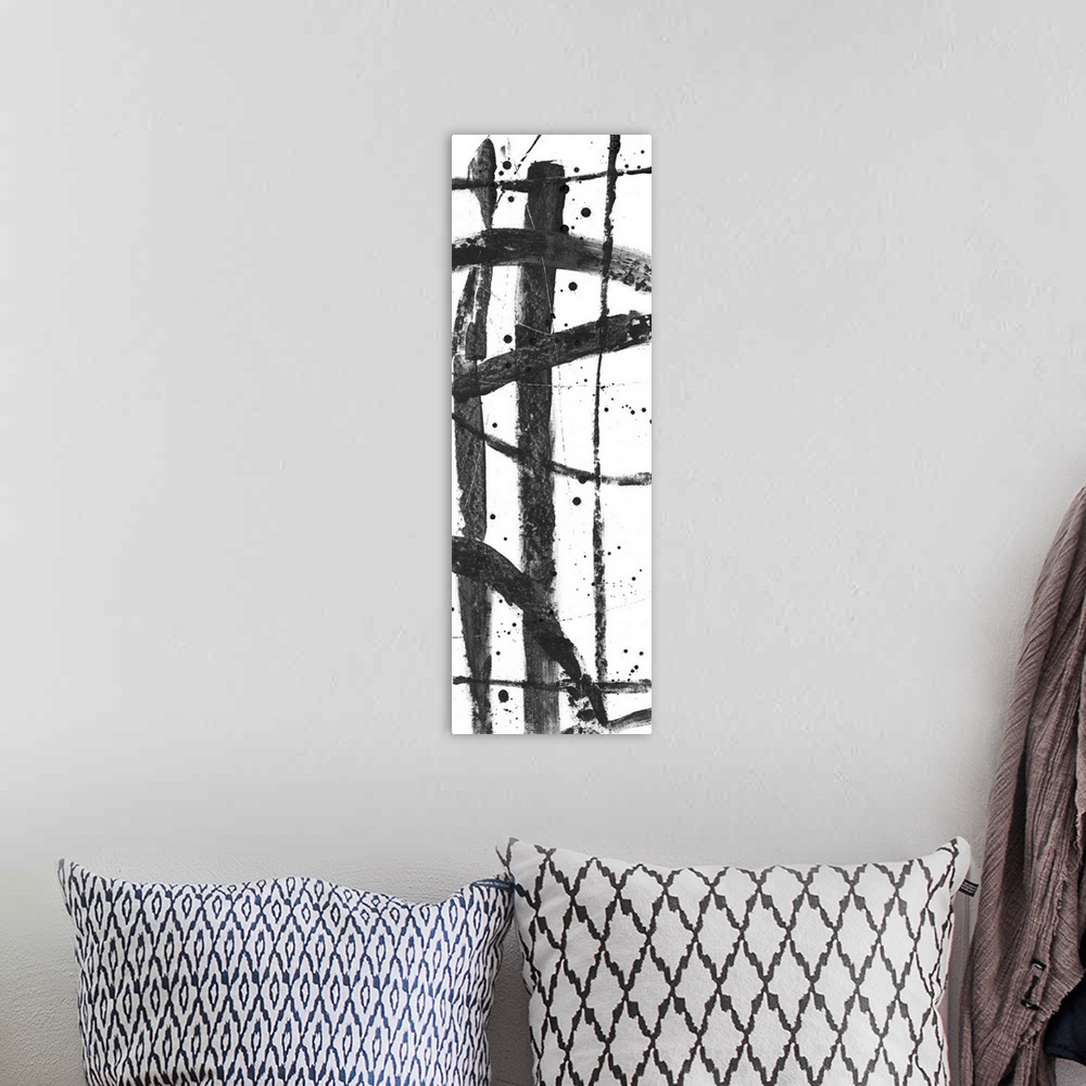 A bohemian room featuring Contemporary abstract painting with criss-crossing black lines on a white background.