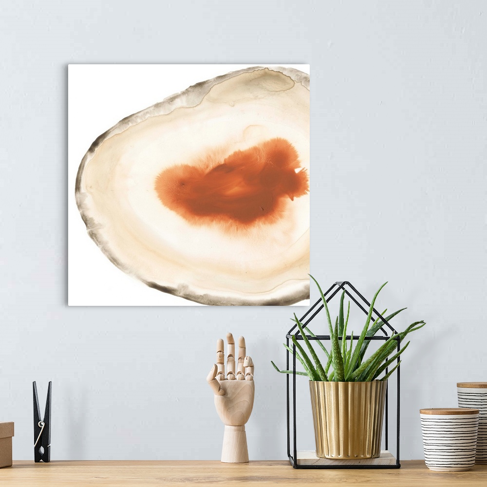 A bohemian room featuring Watercolor painting of a geode stone with orange accents on a white background.