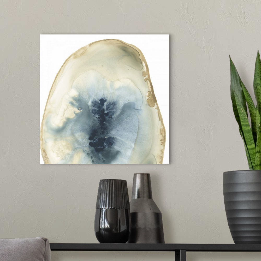 A modern room featuring Watercolor painting of a geode stone with blue accents on a white background.