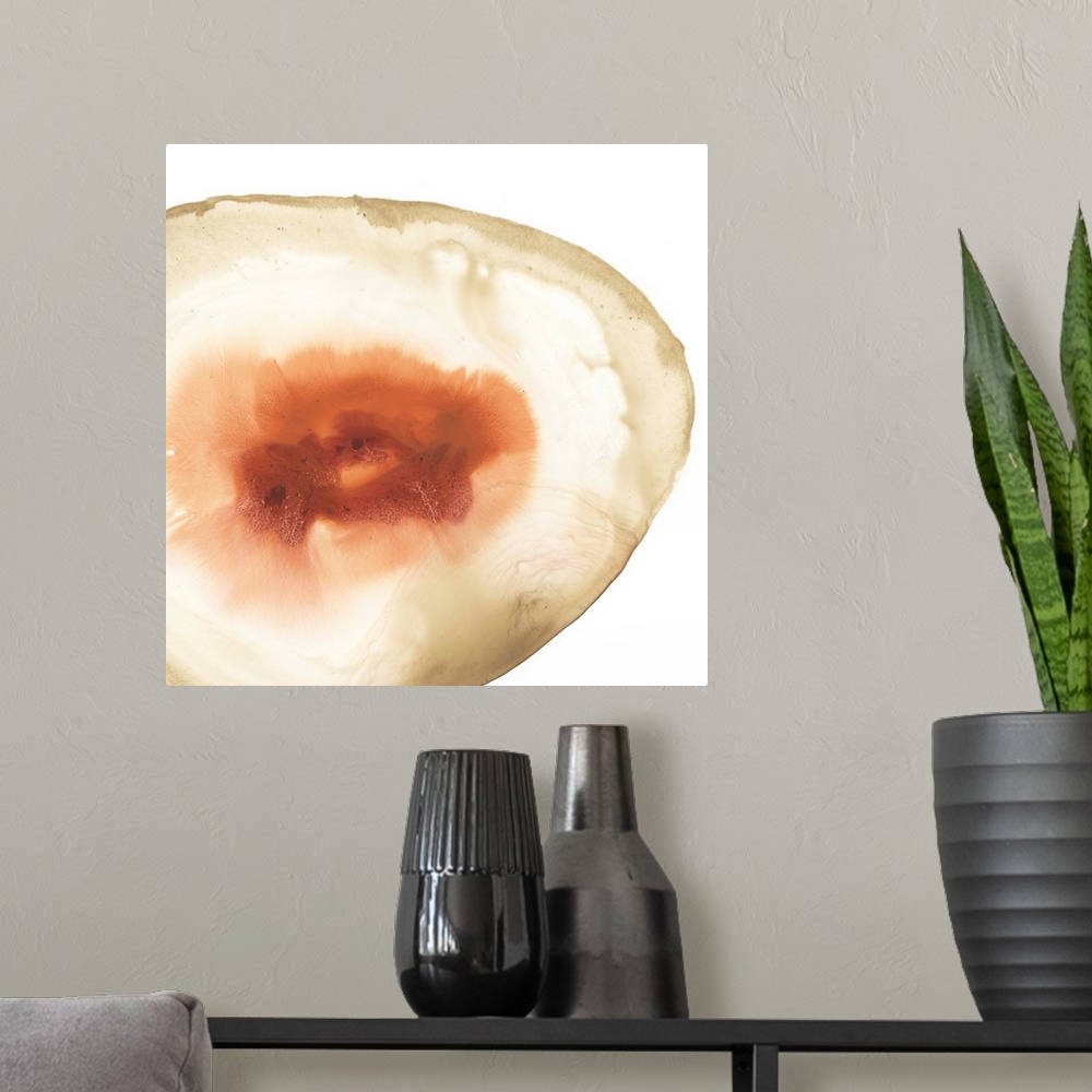 A modern room featuring Watercolor painting of a geode stone with orange accents on a white background.
