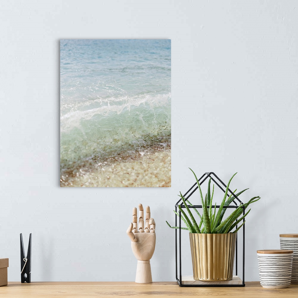 A bohemian room featuring Photograph of clear ocean water lapping the sand, Corfu, Greece.