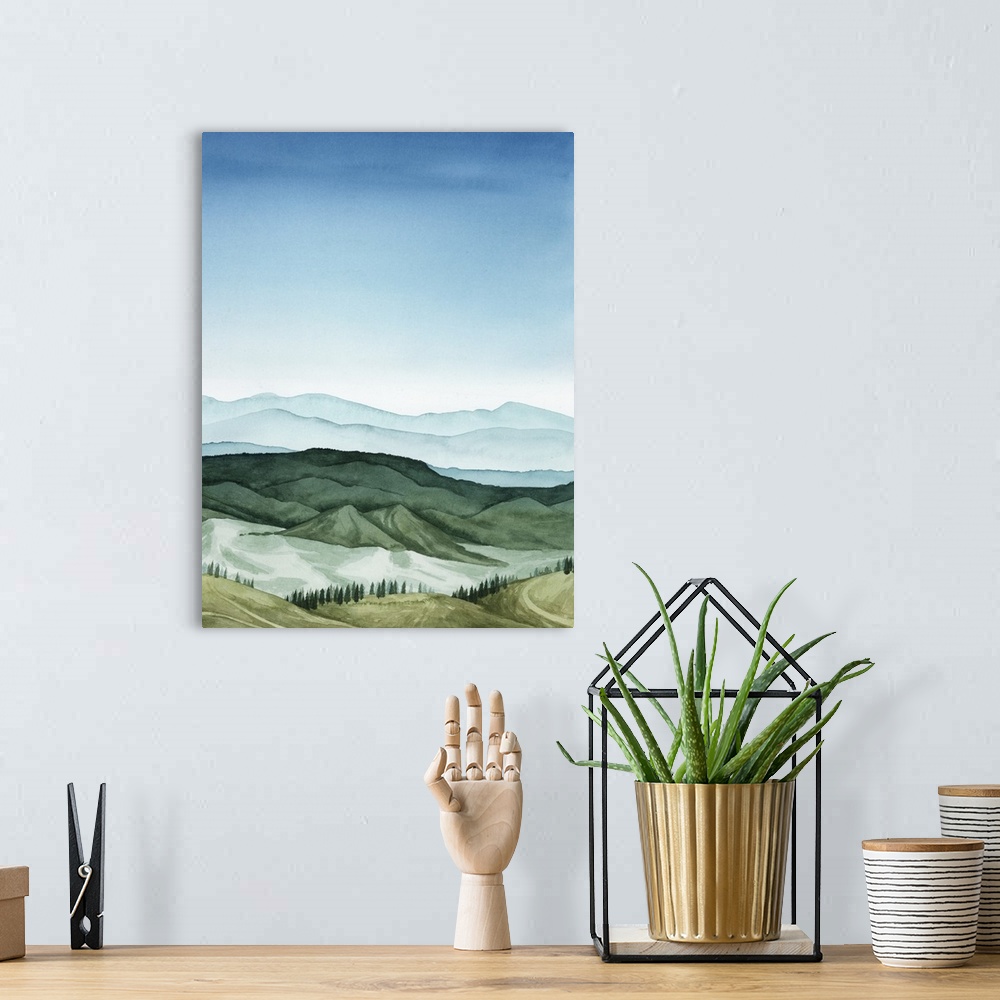 A bohemian room featuring In this blue and green watercolor landscape, mountains are defined by gradated shadows with light...