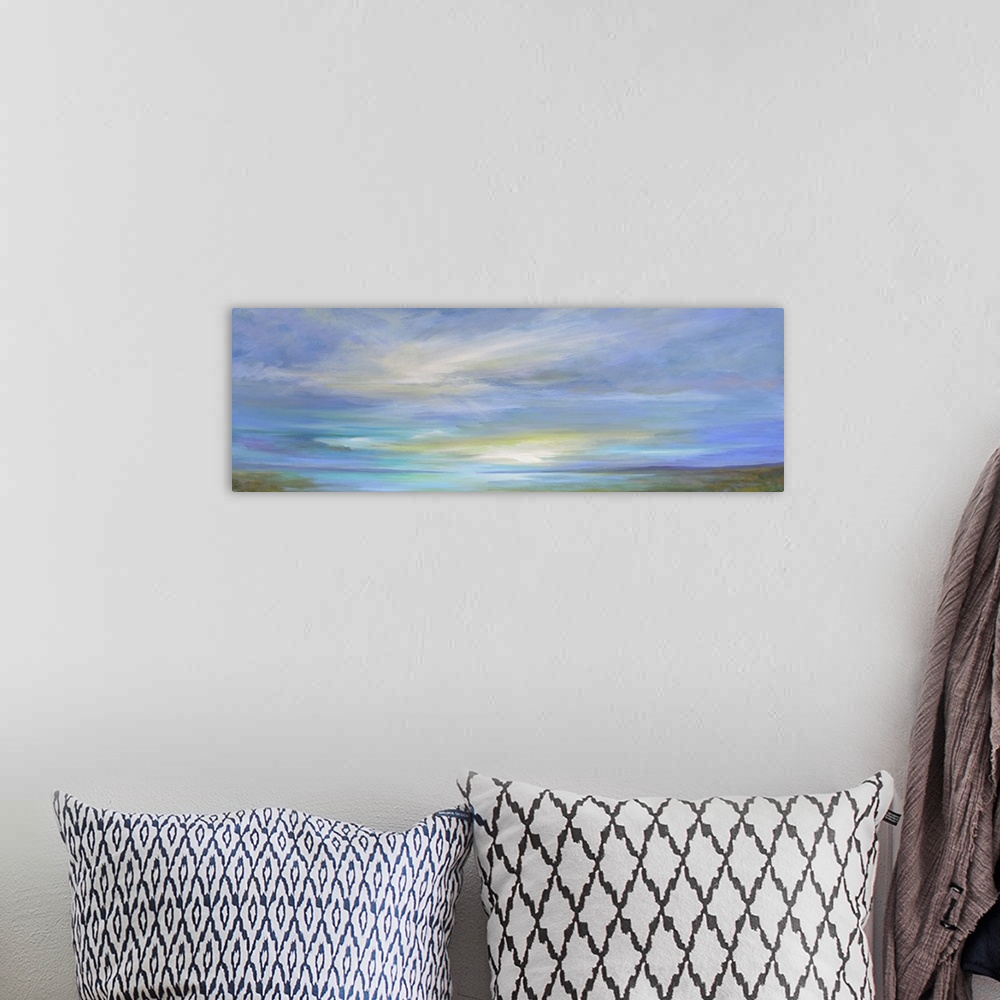 A bohemian room featuring Contemporary painting of pastel clouds over calm waters.