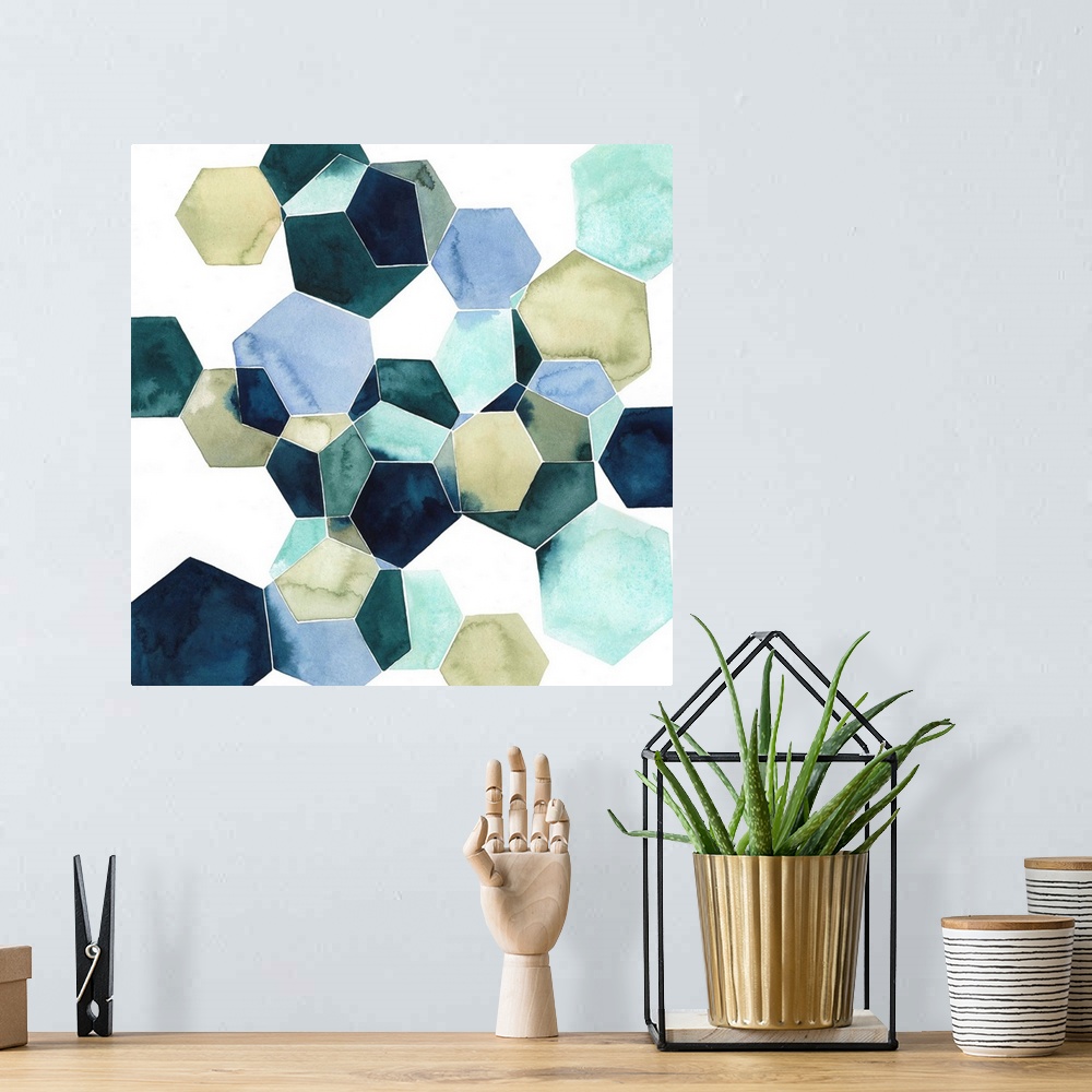 A bohemian room featuring Watercolor geometric painting of intersecting hexagons in blue tones.