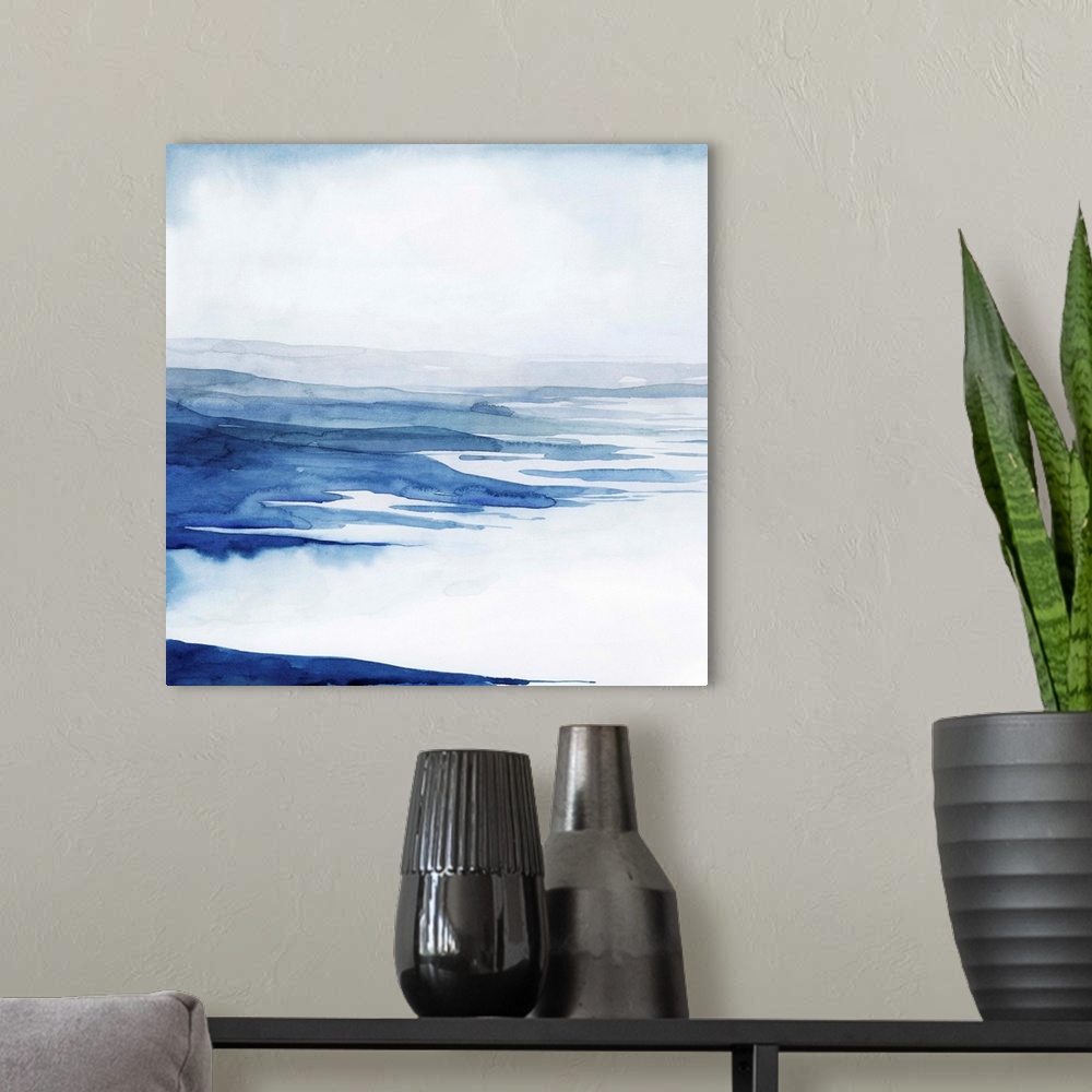 A modern room featuring Blue and white abstract artwork resembling rushing glacial water.