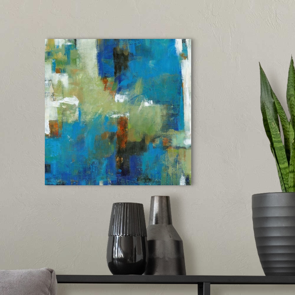 A modern room featuring Contemporary abstract painting using vibrant blue and green tones.