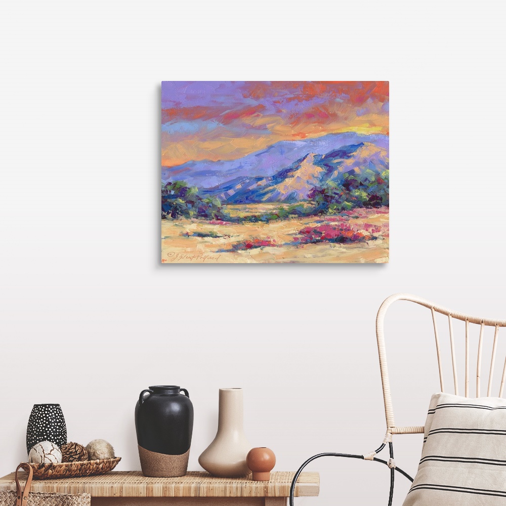 A farmhouse room featuring Contemporary vibrant landscape painting of a desert mountain sunset.