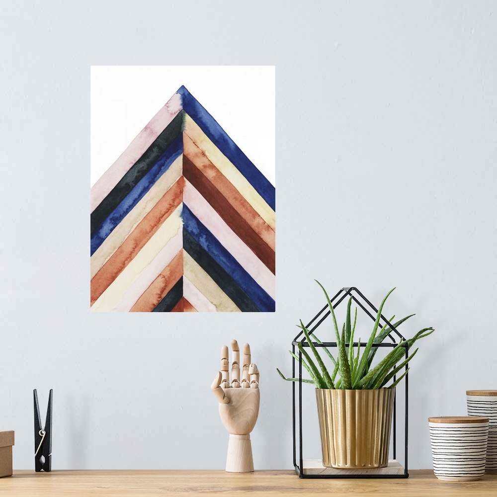 A bohemian room featuring Watercolor painting of angled stripes of colors meeting in the center on a white background.
