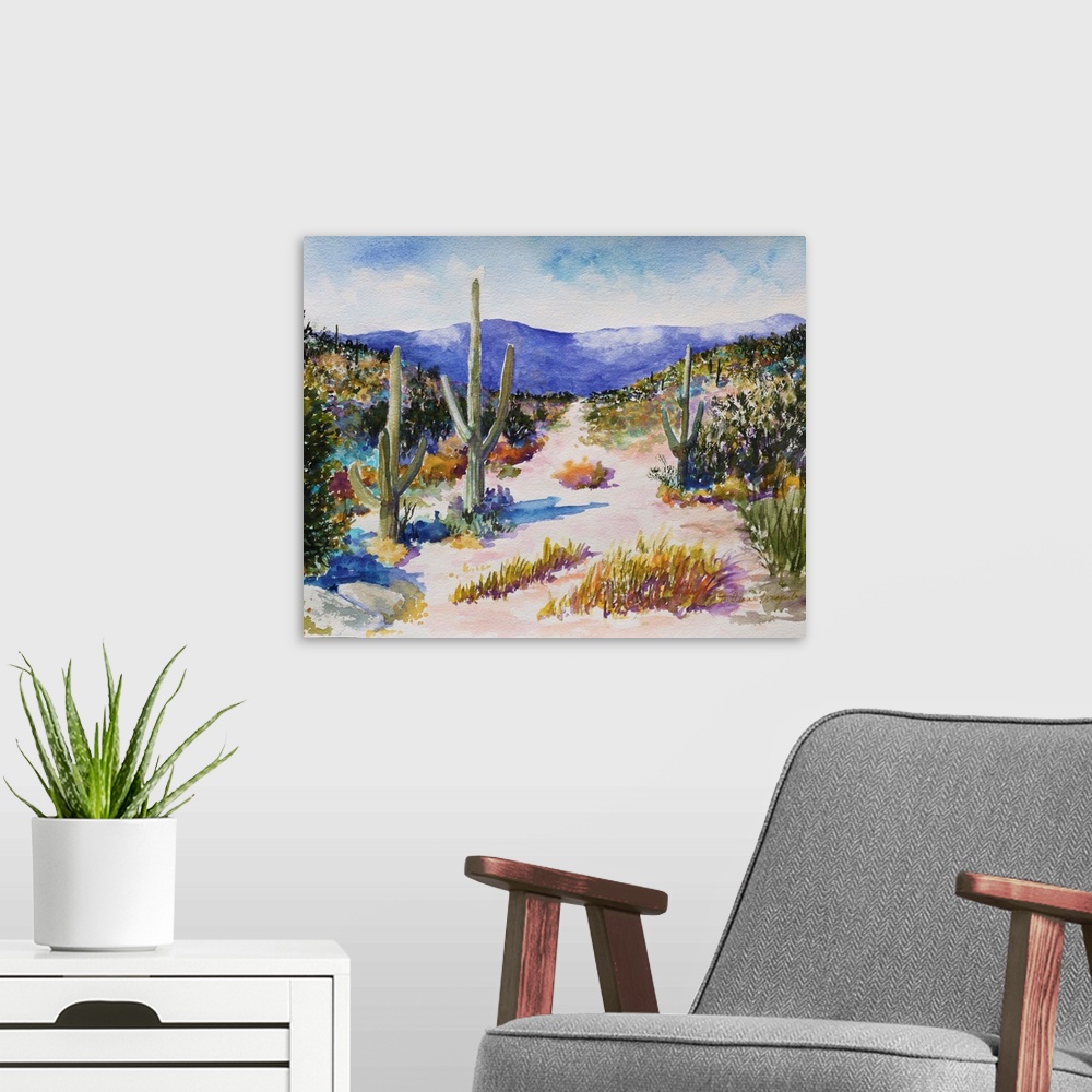 A modern room featuring A beautiful watercolor painting of tall cactus in a lush desert landscape