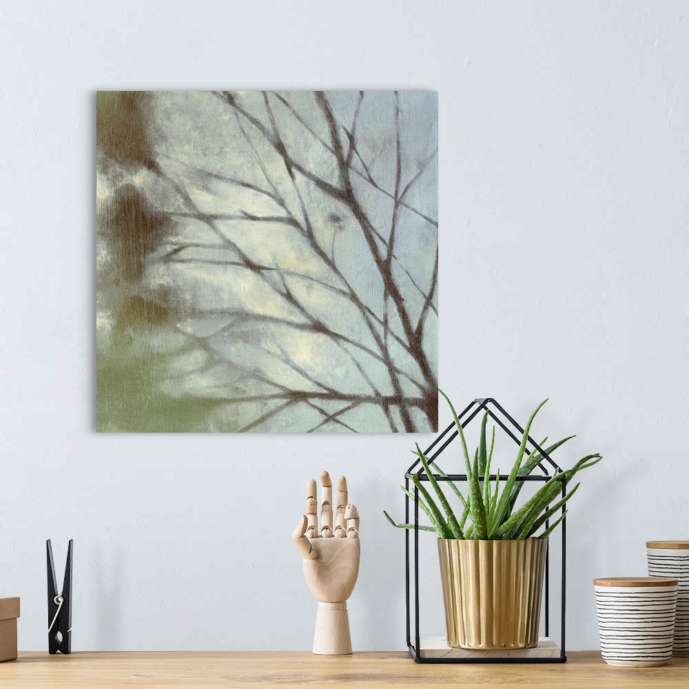 A bohemian room featuring Square painting on canvas of tree branches.