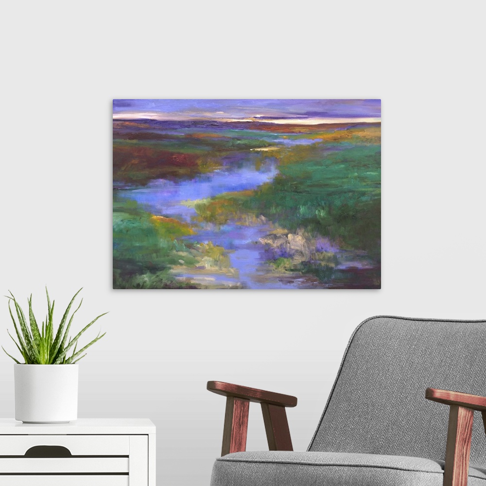 A modern room featuring Contemporary landscape artwork of a river running through a marshy countryside.