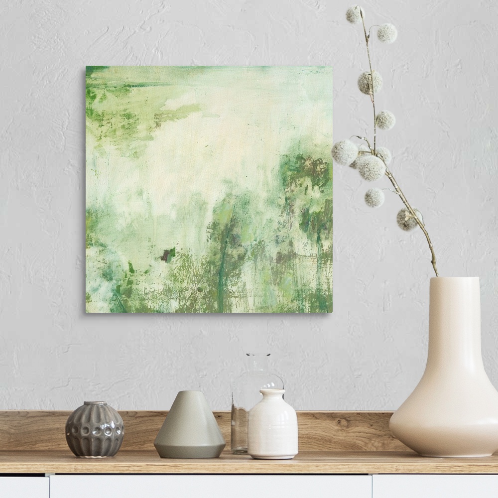 A farmhouse room featuring Abstract artwork in mossy green shades and textures.