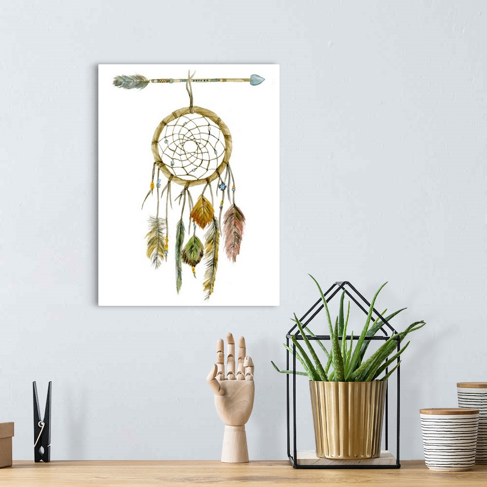 A bohemian room featuring Decorative painting of a dream catcher with feathers hanging from the bottom and an arrow holding...