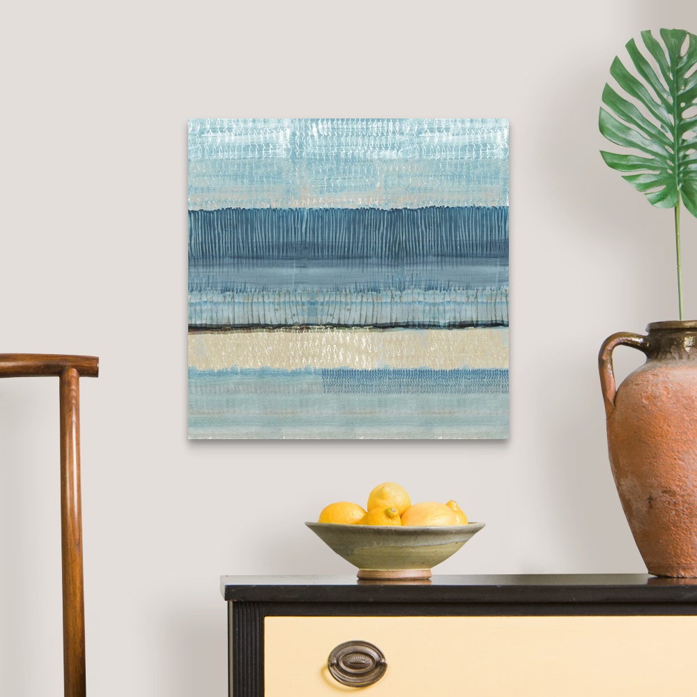A traditional room featuring Textured blue abstract seascape painting